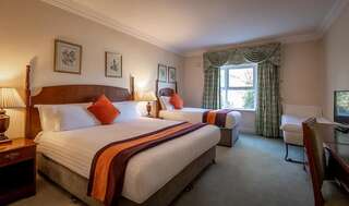 Отель Hotel Woodstock Ennis Эннис Улучшенный семейный номер (для 2 взрослых и 2 детей)-5